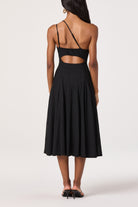 Midi dress with adjustable straps and open back cutout detail with flared skirt.