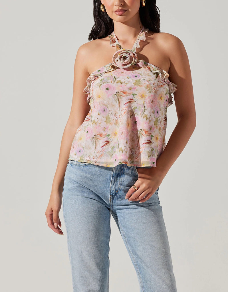 Astrid Alix Top Pink Floral. This halter neck top features rosette and ruffle details with an open back for the perfect date night top, in both solid and print for whatever you're feeling.