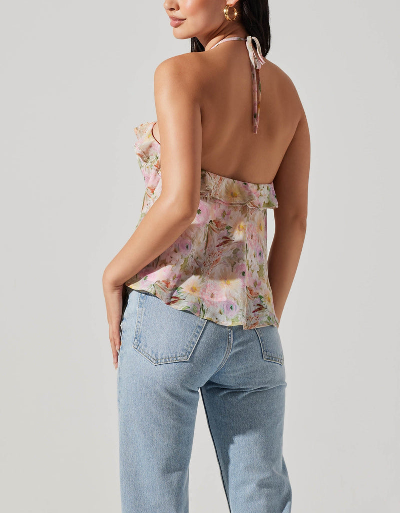 Astrid Alix Top Pink Floral. This halter neck top features rosette and ruffle details with an open back for the perfect date night top, in both solid and print for whatever you're feeling.