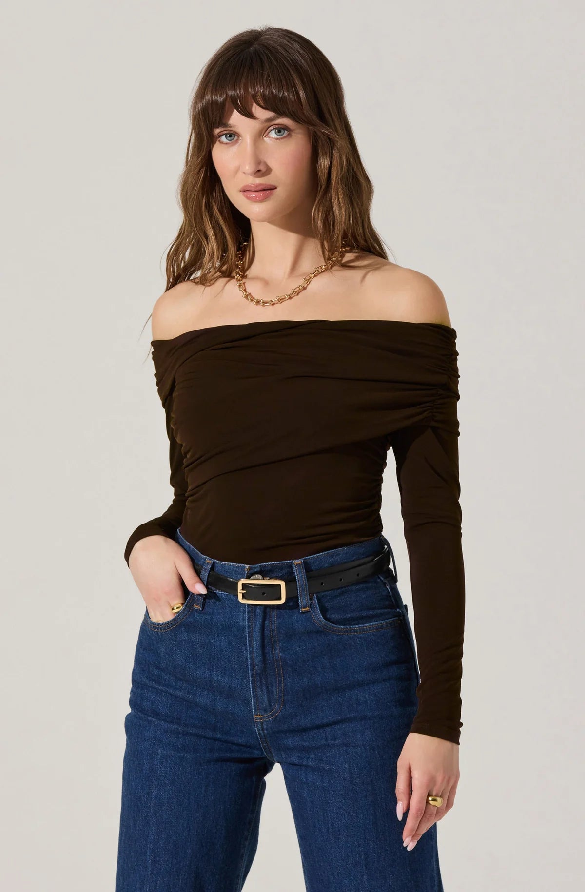 off shoulder ruched top, brown off shoulder shirt, chocolate long sleeve top, women’s date night top, fitted ruched blouse, elegant off shoulder style, brown going out top, chic evening outfit, fall fashion top, trendy women’s blouse, soft stretch ruched top, modern brown top