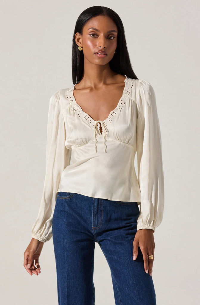 Eyelet trim satin top
Plunging v-neckline with scalloped floral eyelet trim white blouse holiday looks holiday 2025 long sleeve blouse ivory blouse