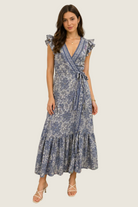 Printed wrap midi dress with ruffle sleeves, tie waist, and tiered hem
