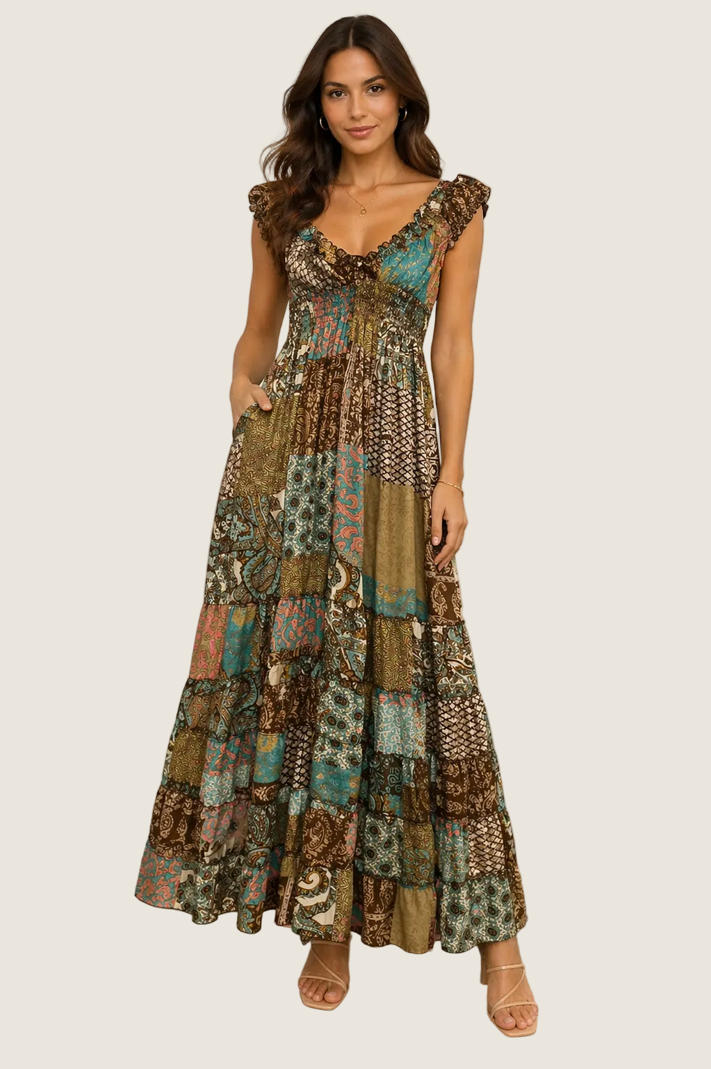 Patchwork print maxi dress with scoop neckline, ruffle trim, smocked bodice, and tiered skirt on model