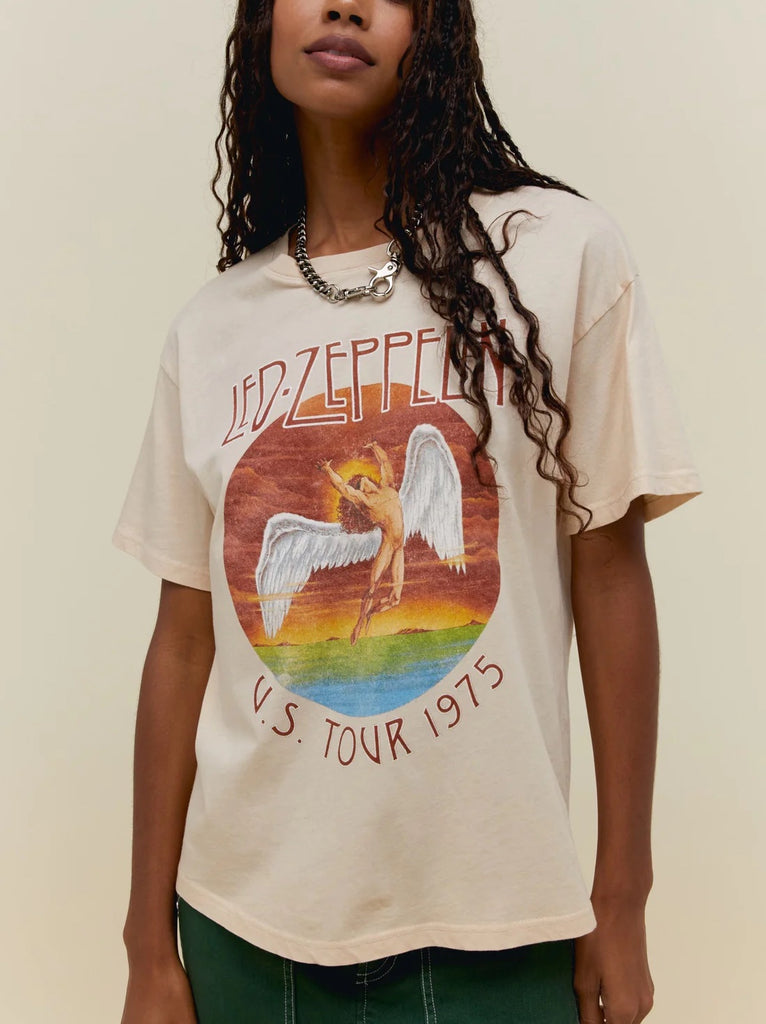 Day Dreamer Led Zeppelin Tour Tee Sand. A Led Zeppelin tee packed with an authentic ease and edge courtesy of the iconic 1975 Led Zep tour graphic that you’ve seen, worn and loved again and again, placed on a boyfriend tee that will fit right into your rotation.