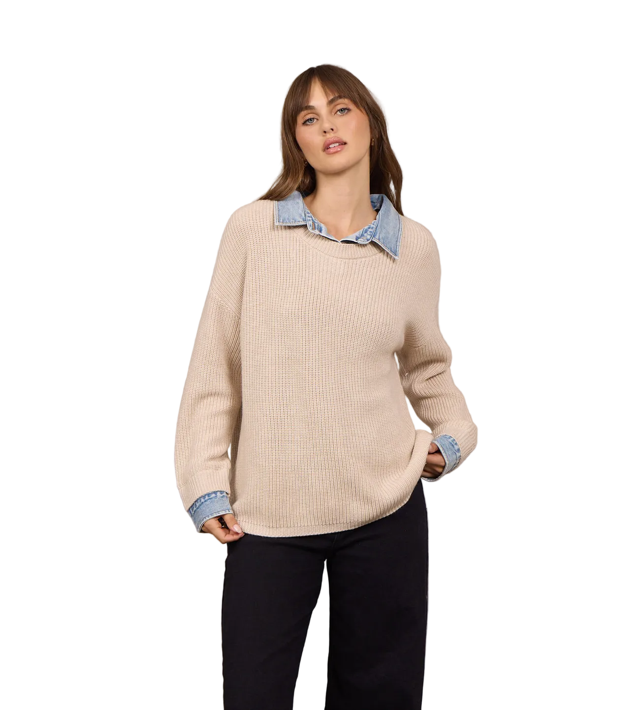 Model wearing a relaxed-fit knit sweater with an attached denim collar and cuff details paired with dark pants.