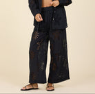 wide leg pants women, cutout pants, resort wear pants, vacation pants women, lightweight women’s pants, flowy pants