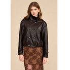 A relaxed chocolate brown jacket featuring a double-breasted front, oversized collar, gathered hem, and button-tab cuffs for a polished everyday look