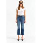 Shy Girl in Influencer Jeans featuring a deep blue wash, high-rise cropped flare silhouette, and scissor-cut hem