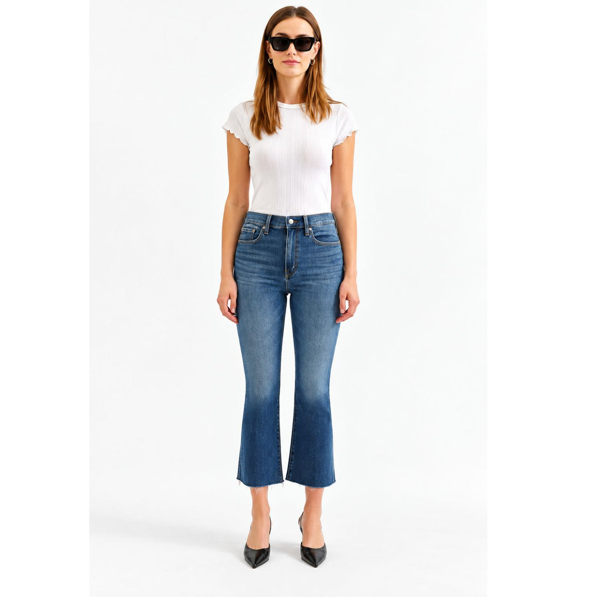 Shy Girl in Influencer Jeans featuring a deep blue wash, high-rise cropped flare silhouette, and scissor-cut hem