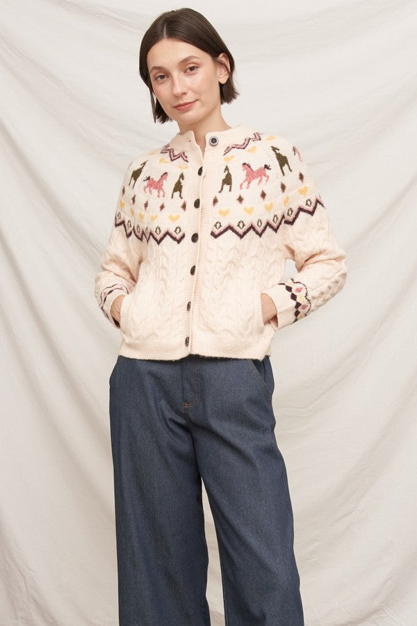 En Creme Horse Motif Cable Knit Cardigan in Beige, front view with hands in pockets