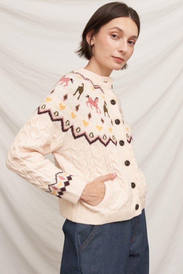 En Creme Horse Motif Cable Knit Cardigan in Beige, angled side view