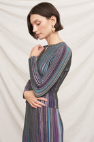 En Creme Multicolor Striped Knit Top in Black, side profile view