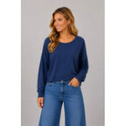 Basic Round Neck Pullover with a fitted silhouette, lightweight knit, classic round neckline, and clean front seam detailing.