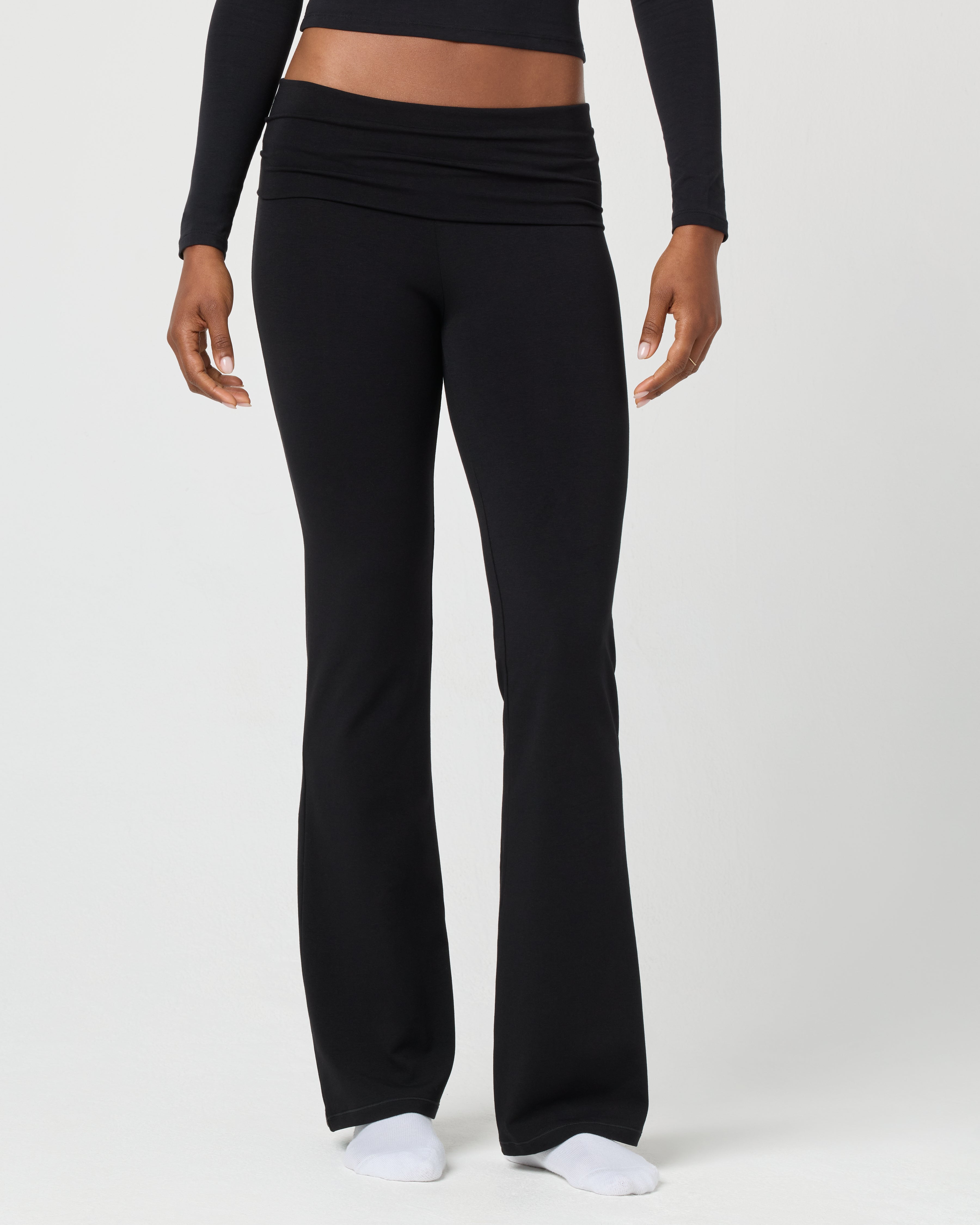 foldover yoga pants, black flare yoga pants, women’s foldover leggings, stretchy black pants, lounge flare pants, soft yoga pants, high waist foldover pants, black flare activewear, comfy yoga bottoms, everyday stretch pants, women’s flared leggings, foldover waistband pants
