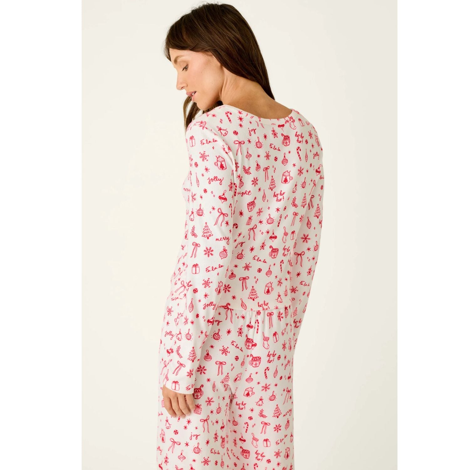 Ivory cropped pajama top with red Christmas print, scoop neckline, and long sleeves