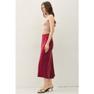 Women's suede-feel midi skirt with a high-rise elastic waistband, pull-on design, and flowing fit-and-flare silhouette