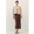 Women's suede-feel midi skirt with a high-rise elastic waistband, pull-on design, and flowing fit-and-flare silhouette