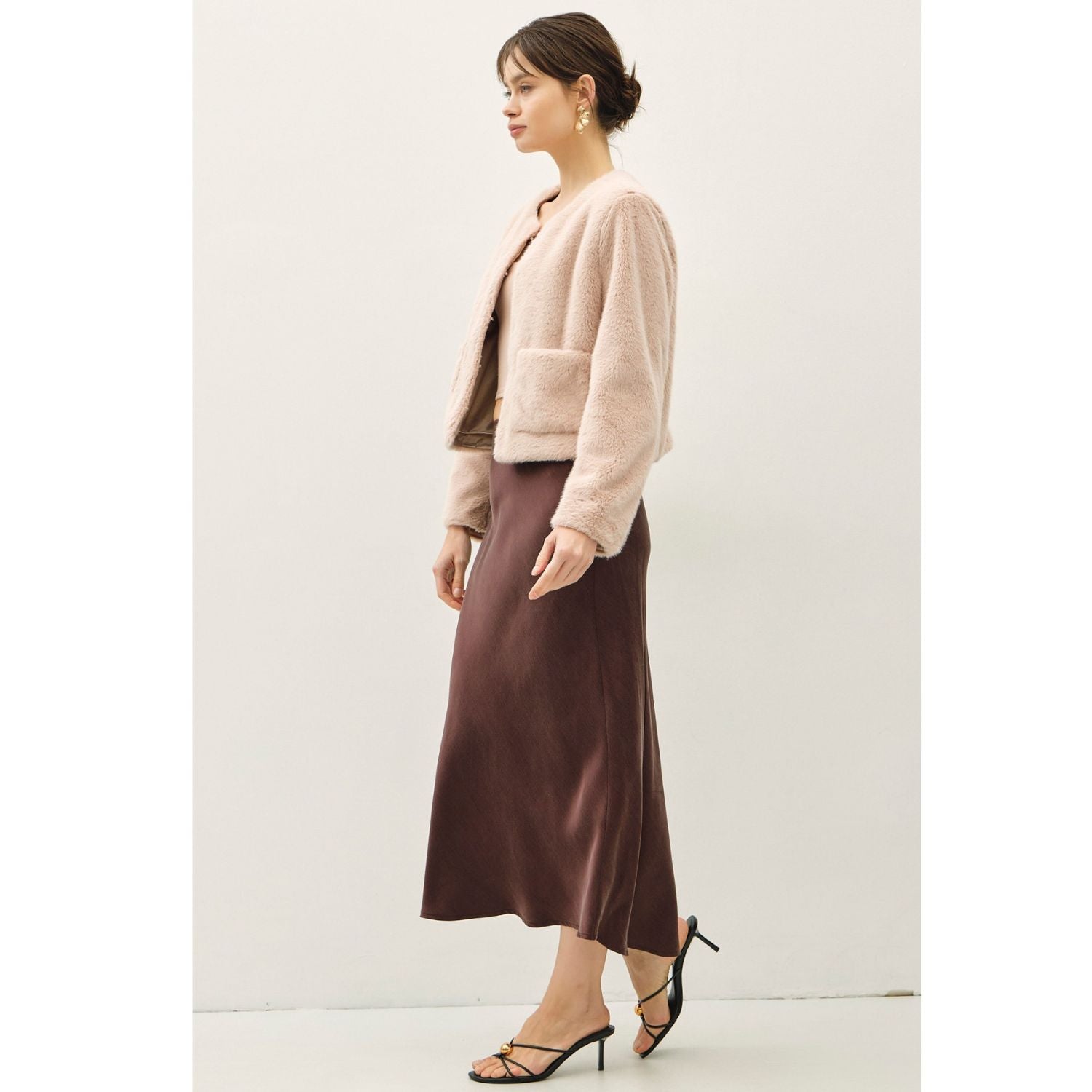 Women's suede-feel midi skirt with a high-rise elastic waistband, pull-on design, and flowing fit-and-flare silhouette