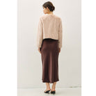 Women's suede-feel midi skirt with a high-rise elastic waistband, pull-on design, and flowing fit-and-flare silhouette