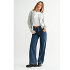 High-Rise Straight-Leg Jeans feature a flattering high-rise waist and full-length straight-leg silhouette. The rich dark denim wash creates a sleek, elongated look with a polished finish.