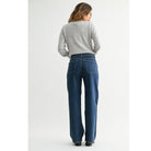 High-Rise Straight-Leg Jeans feature a flattering high-rise waist and full-length straight-leg silhouette. The rich dark denim wash creates a sleek, elongated look with a polished finish.