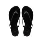 Solei Sea Indie UES Sandal Black. The cushioned footbed, padded arch support, non-slip rubber bottoms and water-resistant vegan leather pack these sandals with the versatility to seamlessly wear to the beach, brunch or anywhere in between.