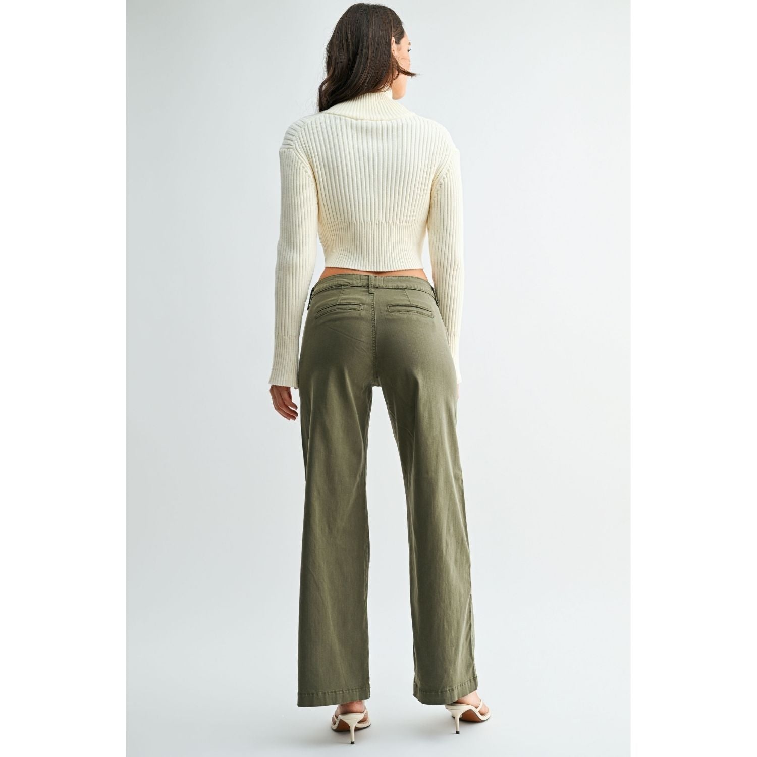 Olive stretch twill pants with a slim wide-leg silhouette, button-front closure, and full-length hem.