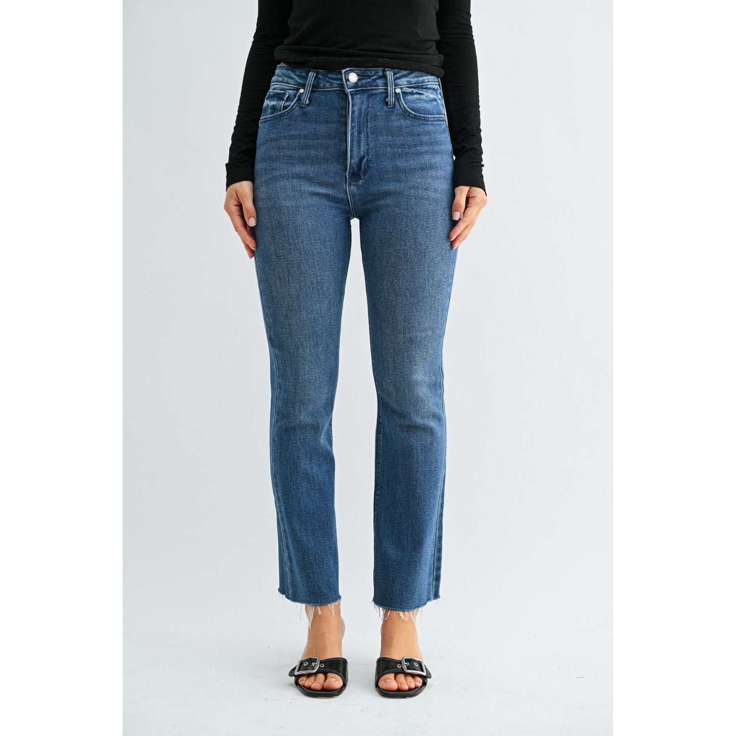 High-Rise Cropped Demi Flare Jeans feature a flattering slim fit through the hips and thighs, with a gently flared leg and cropped length for a modern, stylish silhouette.
