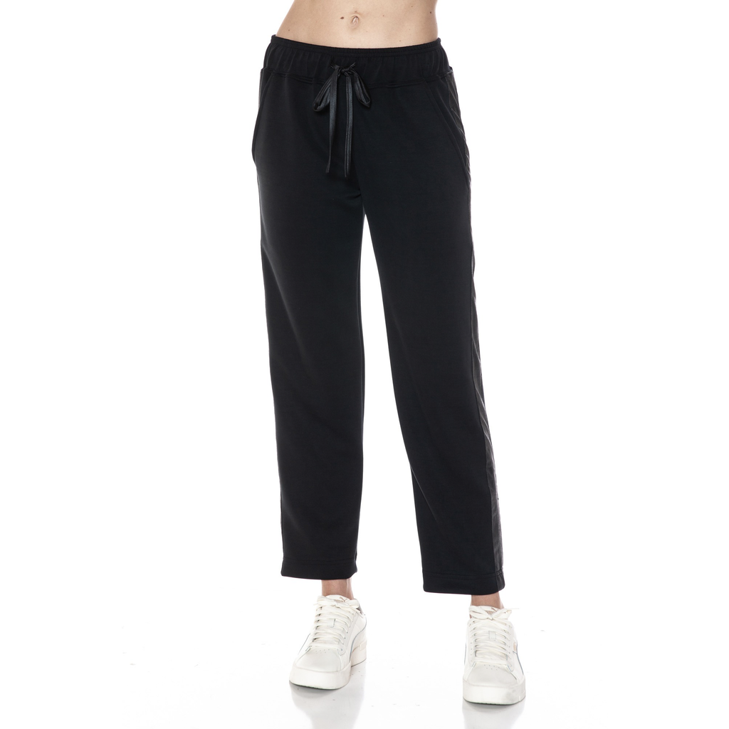 The Jass Straight Leg Pleather Pocket Sweatpants are the perfect mix of edgy and comfy. With sleek pleather pockets and a relaxed straight-leg fit, these sweatpants elevate your lounge game while keeping you cozy. Perfect for when you want to add a little attitude to your casual look without sacrificing comfort.