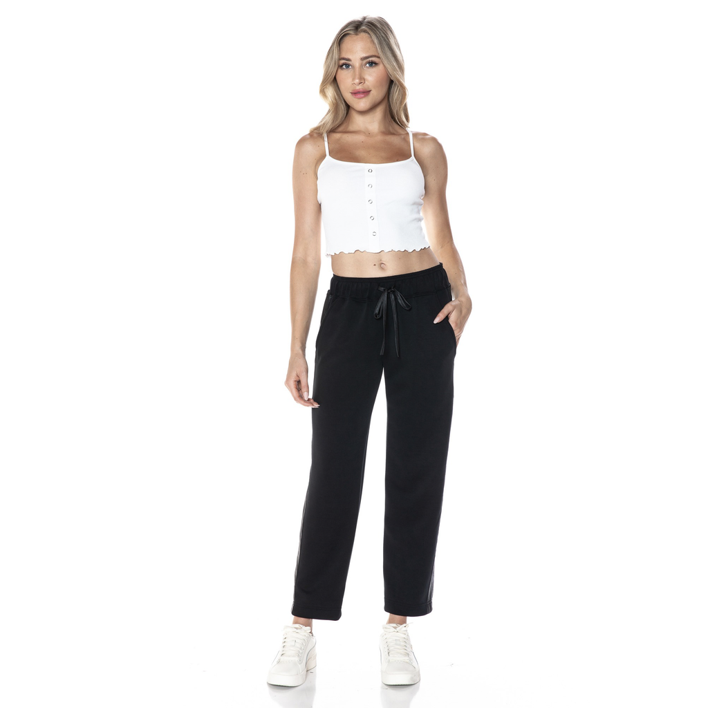 The Jass Straight Leg Pleather Pocket Sweatpants are the perfect mix of edgy and comfy. With sleek pleather pockets and a relaxed straight-leg fit, these sweatpants elevate your lounge game while keeping you cozy. Perfect for when you want to add a little attitude to your casual look without sacrificing comfort.