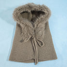 Knit balaclava with plush long-pile trim, ribbed shoulder cape, and tie neckline.