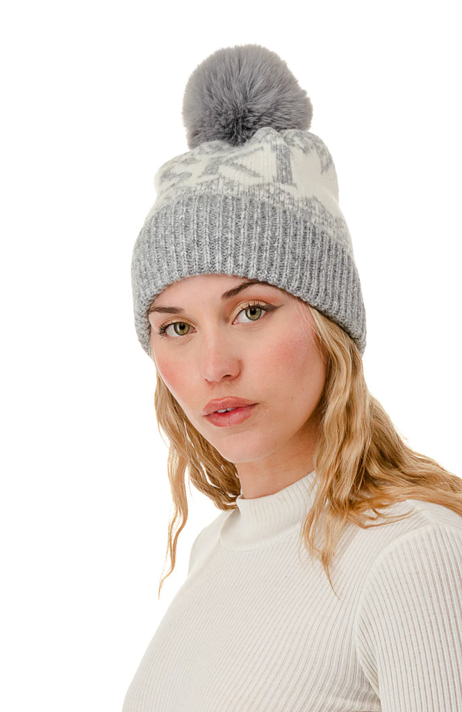 ski pom beanie,  winter hat, women’s knit beanie, faux fur pom hat, cozy ski hat, snow beanie, après-ski style, ribbed knit hat, cute winter accessories, cold weather beanie, ski graphic hat, soft pom pom beanie, winter fashion accessories