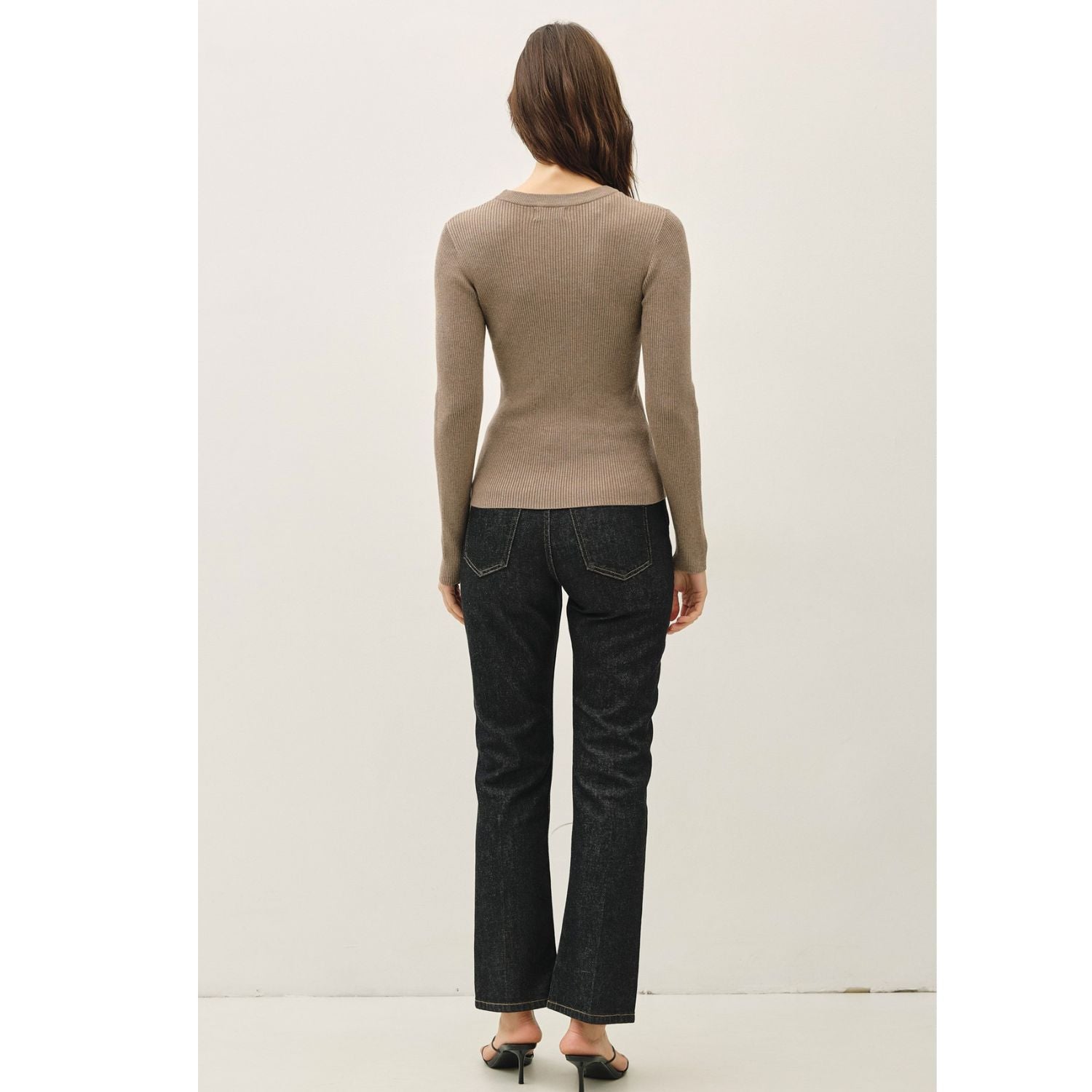 A classic rib-knit crewneck sweater featuring a soft viscose blend, comfortable stretch, long sleeves, and a fitted silhouette for everyday wear