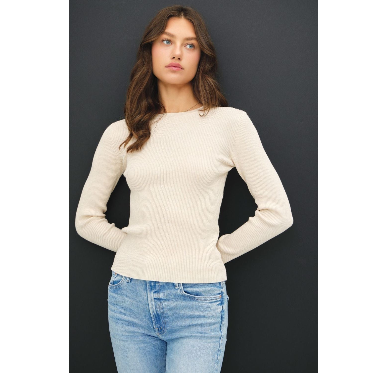 A classic rib-knit crewneck sweater featuring a soft viscose blend, comfortable stretch, long sleeves, and a fitted silhouette for everyday wear
