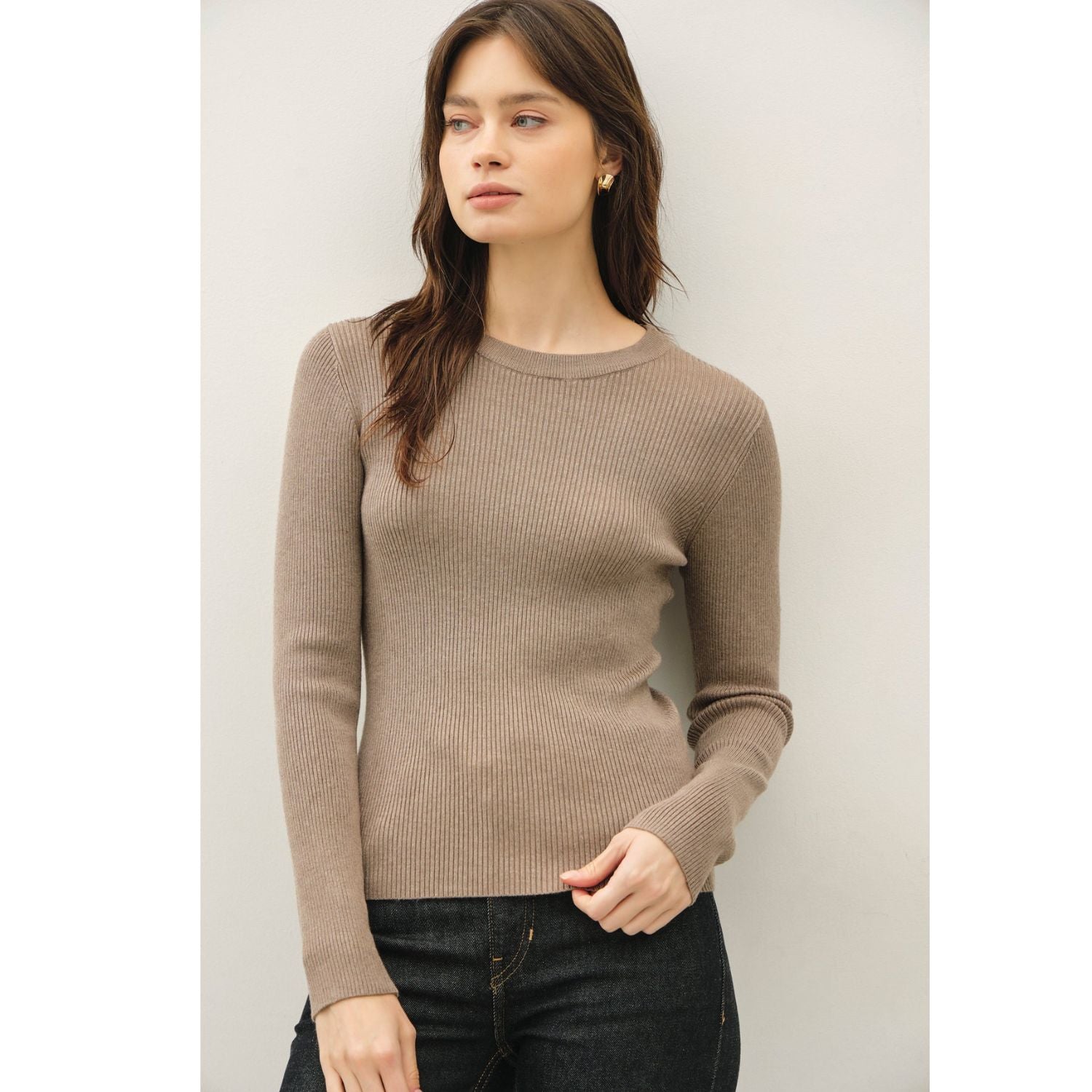 A classic rib-knit crewneck sweater featuring a soft viscose blend, comfortable stretch, long sleeves, and a fitted silhouette for everyday wear