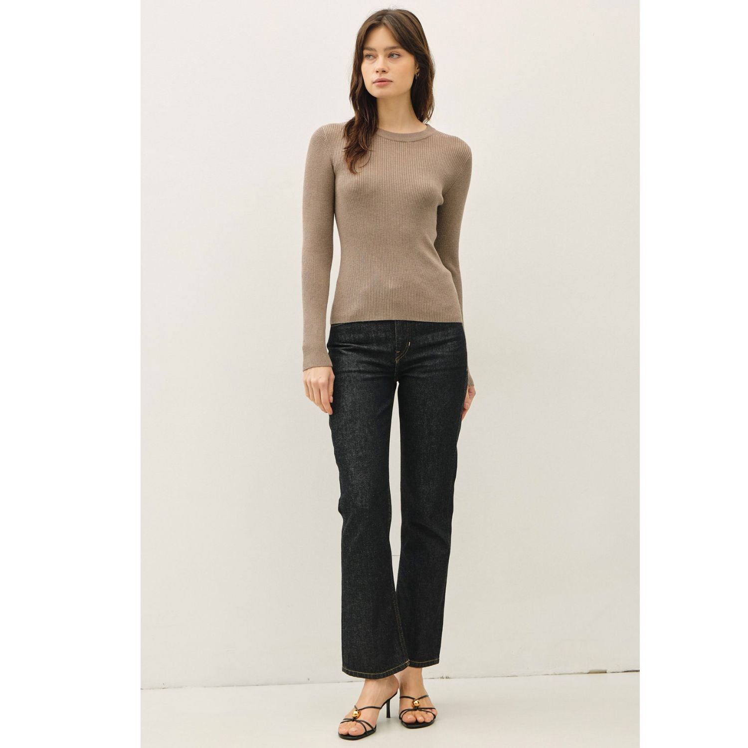 A classic rib-knit crewneck sweater featuring a soft viscose blend, comfortable stretch, long sleeves, and a fitted silhouette for everyday wear