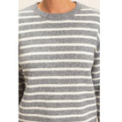 Model wearing Moonbeam Stripe Cozy Crewneck Sweater with black stripes, featuring a relaxed fit and ribbed trims