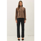 Women's suede-feel bomber jacket with a high collar, zipper and snap-button front, welt pockets, and banded hem