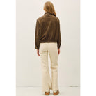 Women's suede-feel bomber jacket with a high collar, zipper and snap-button front, welt pockets, and banded hem