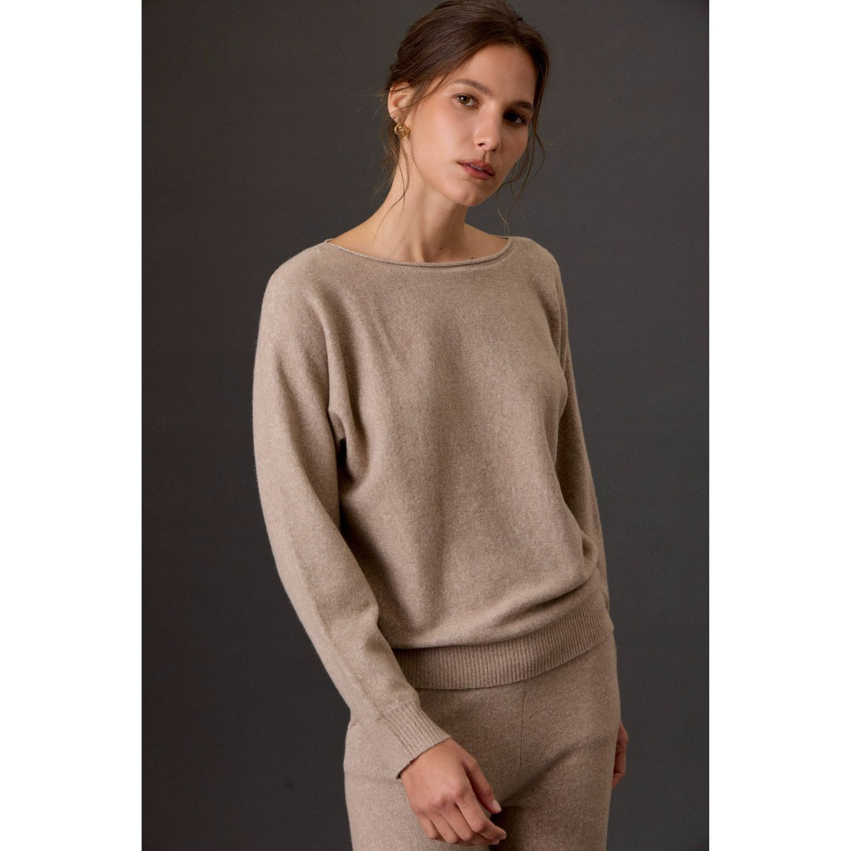 Women's heathered boat neck knit sweater with long sleeves, ribbed cuffs, rolled-edge details, and a relaxed fit