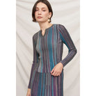 Fitted multicolor striped ribbed knit top with metallic shimmer, split neckline, and long sleeves.