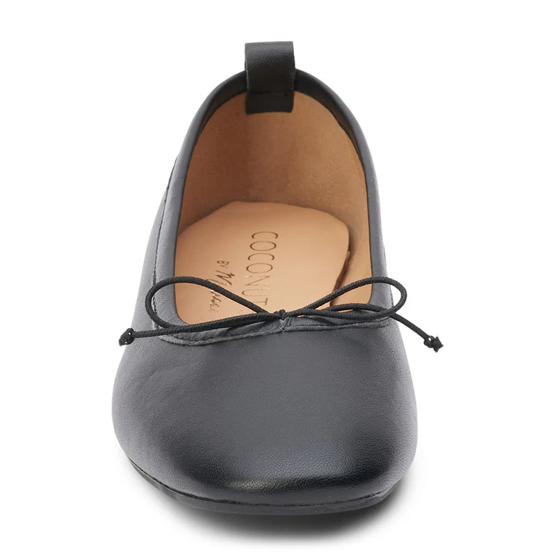 Coconut by Matisse Nikki Ballet Flat Black. These classic ballet flats feature a soft leather design with a small bow detail and slip on style perfect for all day comfort when you're on the go.