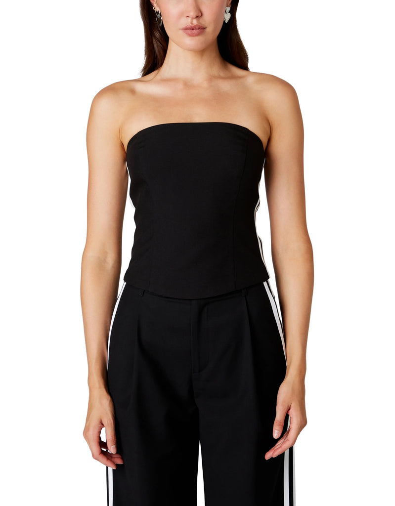 Nia Kato Top Black. This strapless fitted top features two contrast stripes at the sides, wear it on its own with your fav jeans or pants or with the Messi Trouser as a set.