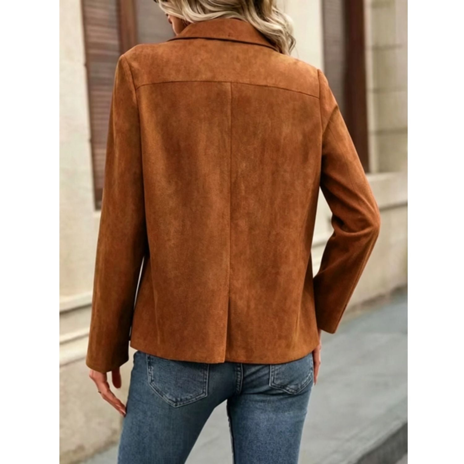 Faux suede jacket with an open front, draped lapel, and long sleeves.