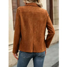 Faux suede jacket with an open front, draped lapel, and long sleeves.