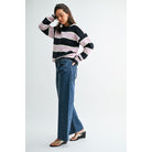 Vintage brown high-rise wide-leg jeans with a curved silhouette and gently tapered ankle.