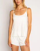 PJ Salvage Ivory Pointelle Hearts Tank Ivory. This sweet ivory sleep camisole in a soft brushed pointelle pattern featuring mini hearts with shelf mini rosette at neckline makes the perfect set with the matching hearts shorts.