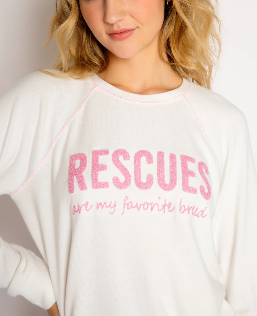 PJ Salvage Rescues Top Ivory. Rescues are our favorite breed. Support a cause in this graphic lounge top from an exclusive collab to benefit the work of Love Leo Rescue, a non-profit dedicated to rescuing and rehabilitating neglected dogs.