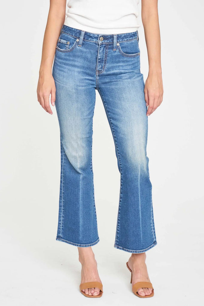 Daze Runaway Jean Affectionate.  This cropped flare is made using "hug" denim, it's a slightly heavier fabric with a stretch that hugs your body, while smoothly cinching you in. In a medium wash with&nbsp;vintage fading, this slightly low rise jean has a defined front crease.