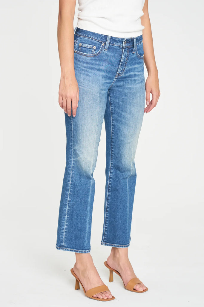 Daze Runaway Jean Affectionate. This cropped flare is made using "hug" denim, it's a slightly heavier fabric with a stretch that hugs your body, while smoothly cinching you in. In a medium wash with&nbsp;vintage fading, this slightly low rise jean has a defined front crease.